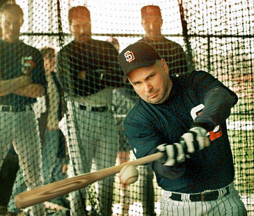 Garth Brooks takes a practice swing